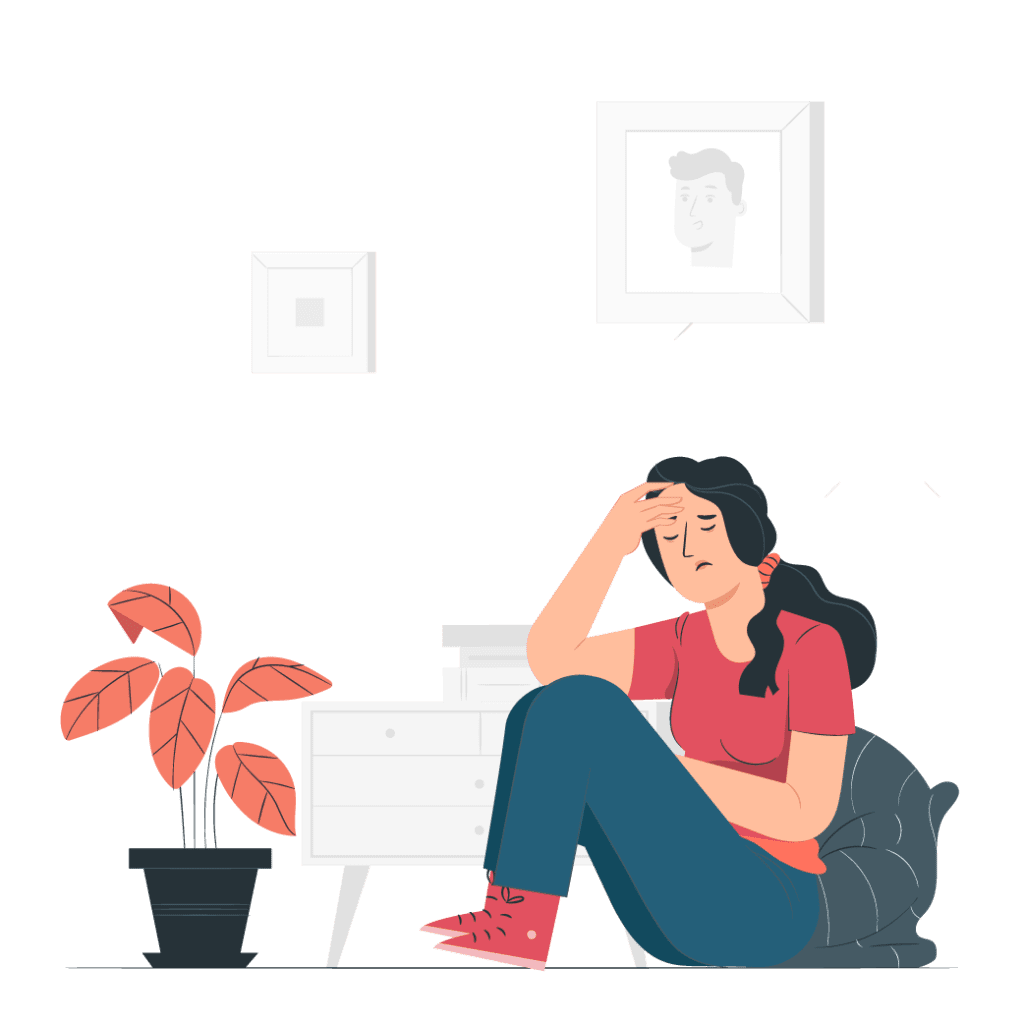 a women sits in front of a plant dealing with the pain of a headache