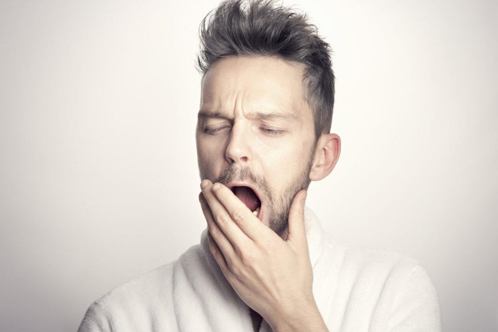 Can Meditation Replace Sleep? - man yawning