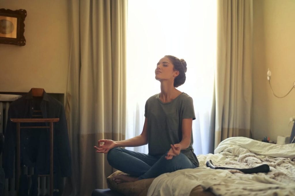 Can Meditation Replace Sleep? - meditating in bed